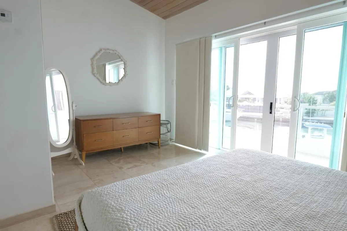 Whispering Palms Villa In Jolly Harbour